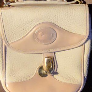 Vintage  Dooney and Bourke  all weather leather cross body carrier